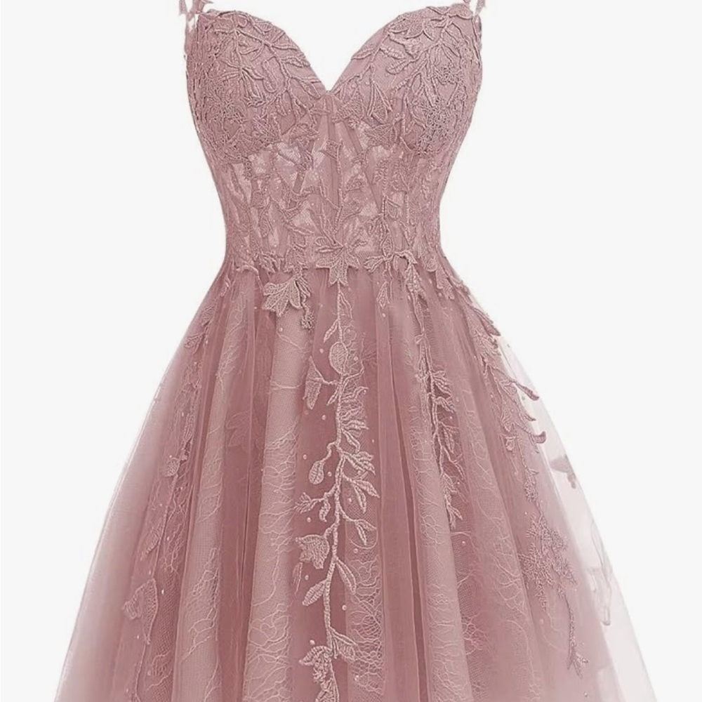 Dessiny brand size 8 spaghetti strap lace dress. Ideal for any occasion. Unworn